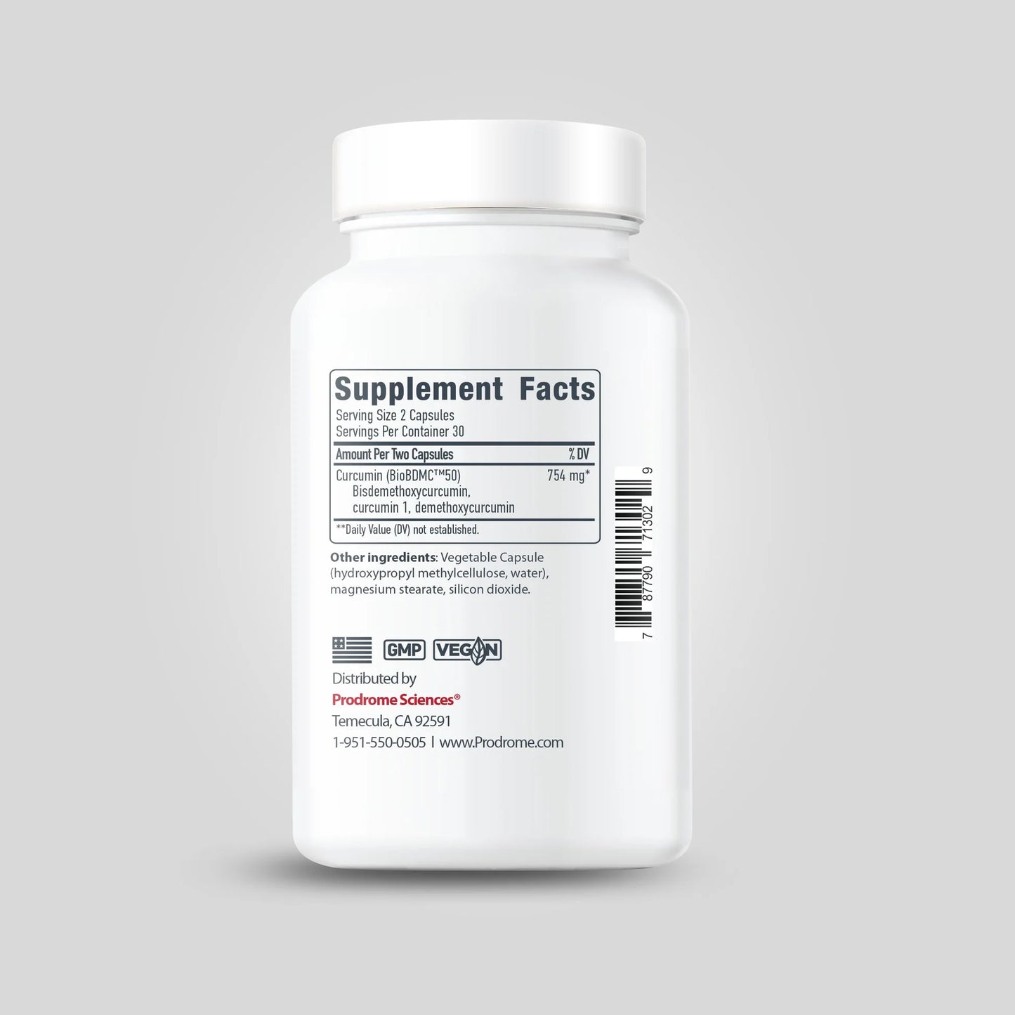 A white bottle of OHP Health Prodrome BDMC Curcumin (GTA) | 60 Capsules displays "Supplement Facts," highlighting curcuminoids and bisdemethoxycurcumin content, plus GMP and vegan logos, manufacturer info, and a barcode.
