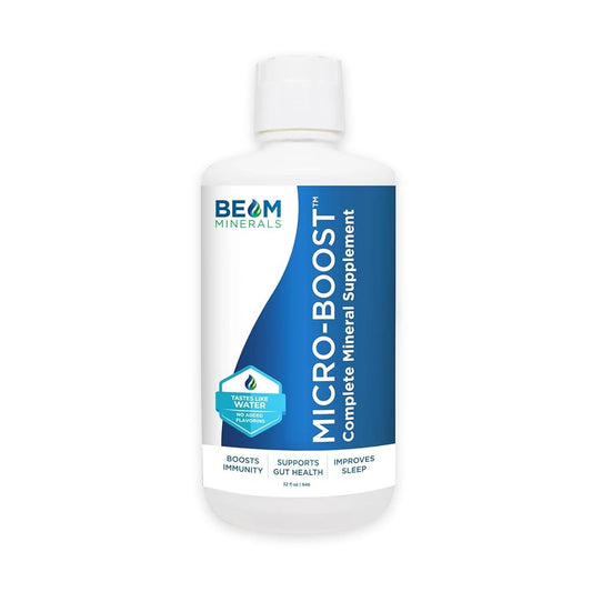 A white plastic bottle labeled "Micro-BOOST" by OHP Health, featuring blue and white design elements and health benefit claims.