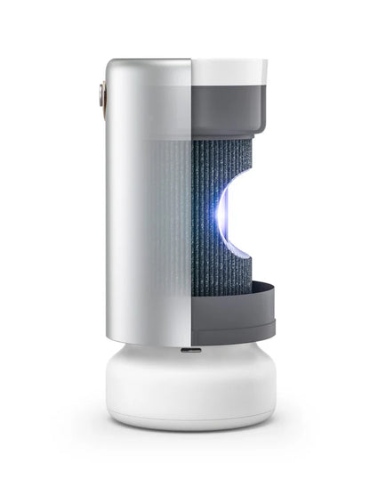 A Molekule Air Purifier System stands against a white background, partially cut away to unveil its interior and a glowing blue light that highlights the advanced PECO technology designed to combat airborne pollutants.