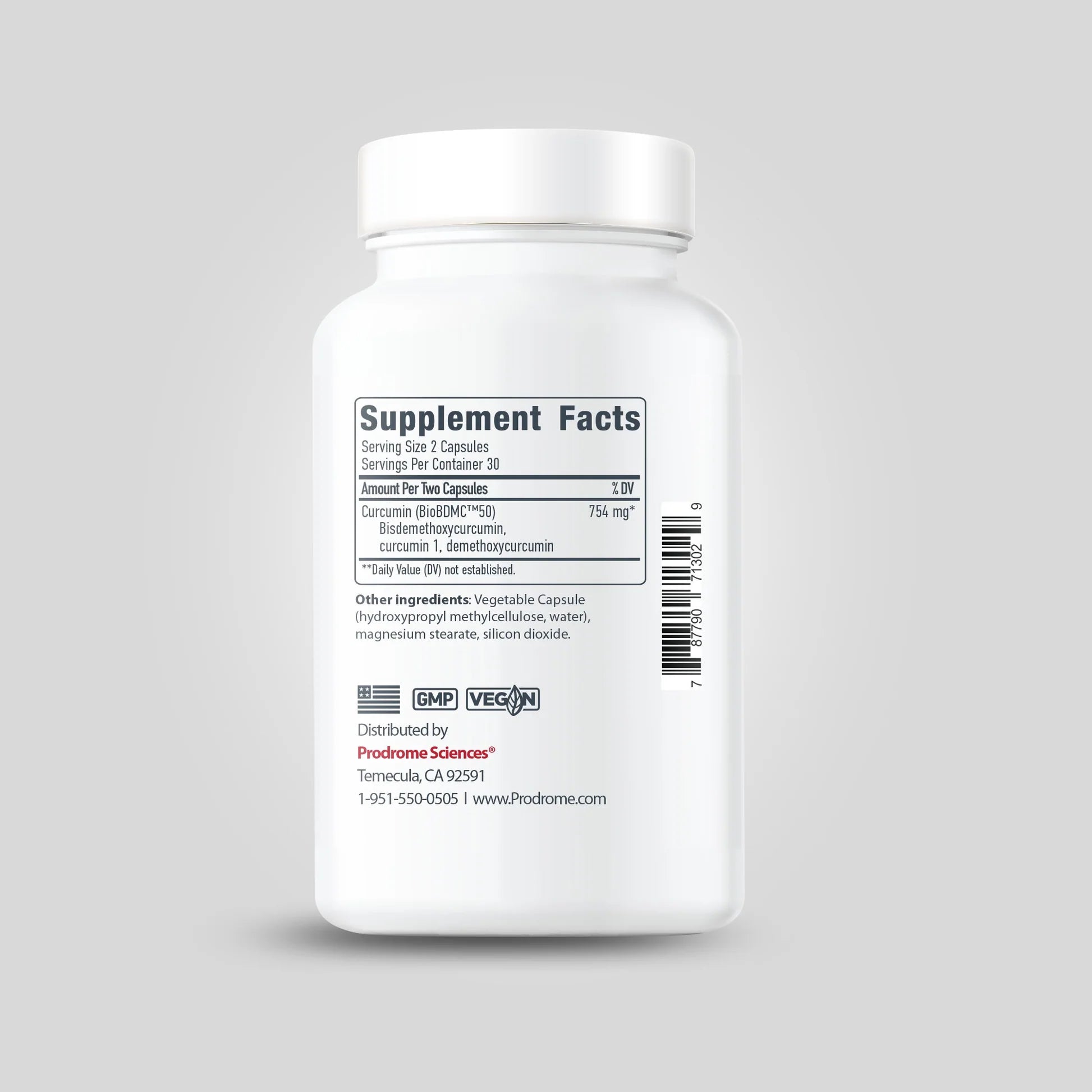 A white bottle of OHP Health Prodrome BDMC Curcumin (GTA) | 60 Capsules displays "Supplement Facts," highlighting curcuminoids and bisdemethoxycurcumin content, plus GMP and vegan logos, manufacturer info, and a barcode.