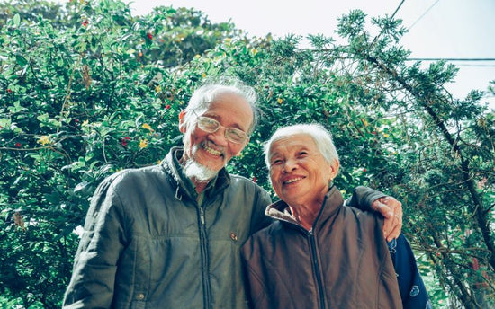 An elderly couple at the Boulder Longevity Institute posing for a photo.